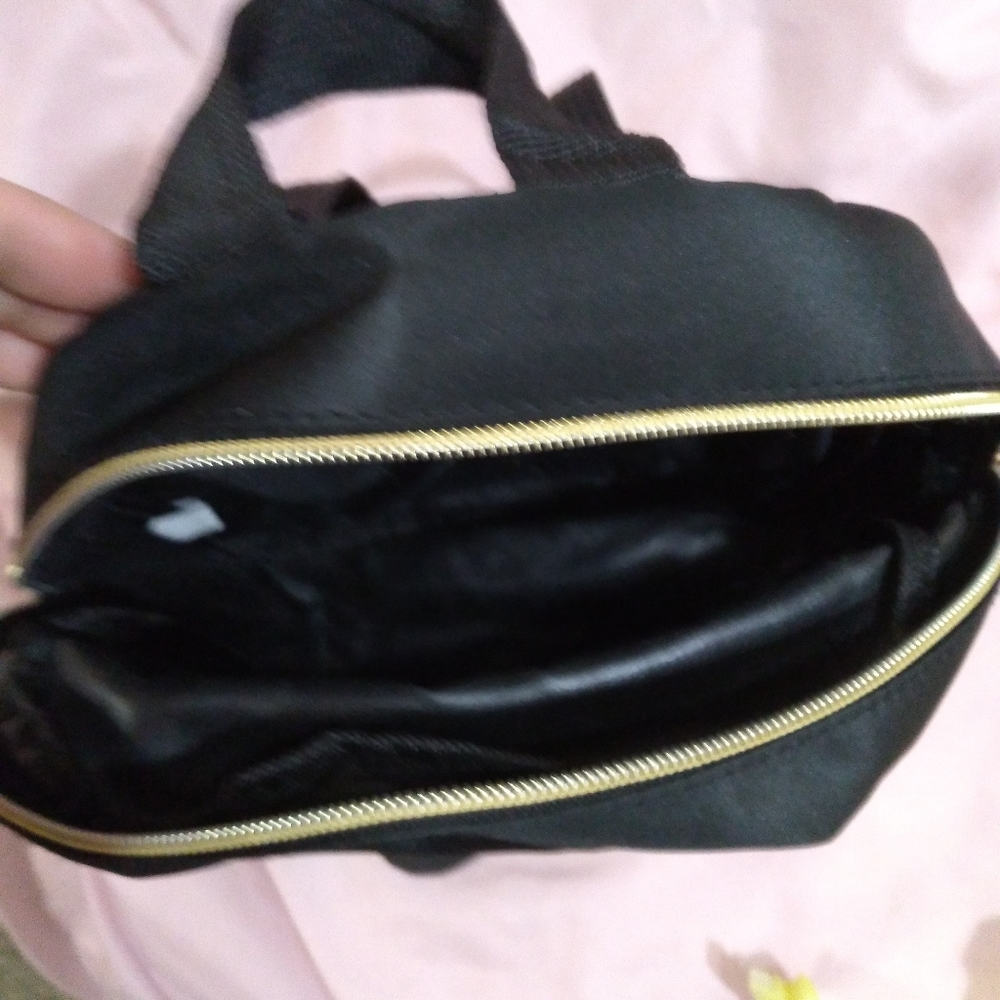 Mini black and gold backpack